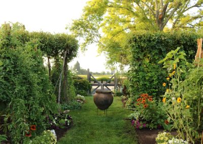 Lush garden beds and plantings showcasing Penning Landscapes maintenance expertise.